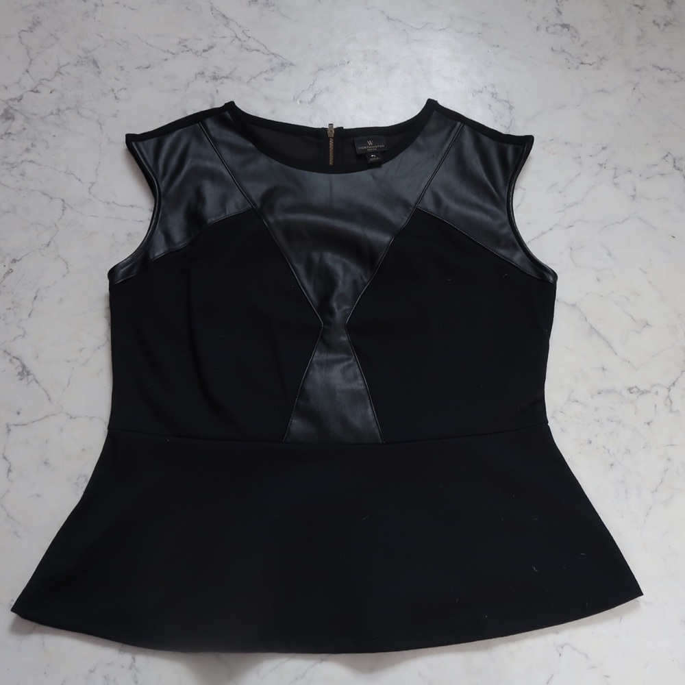 Black peplum top with faux leather accents